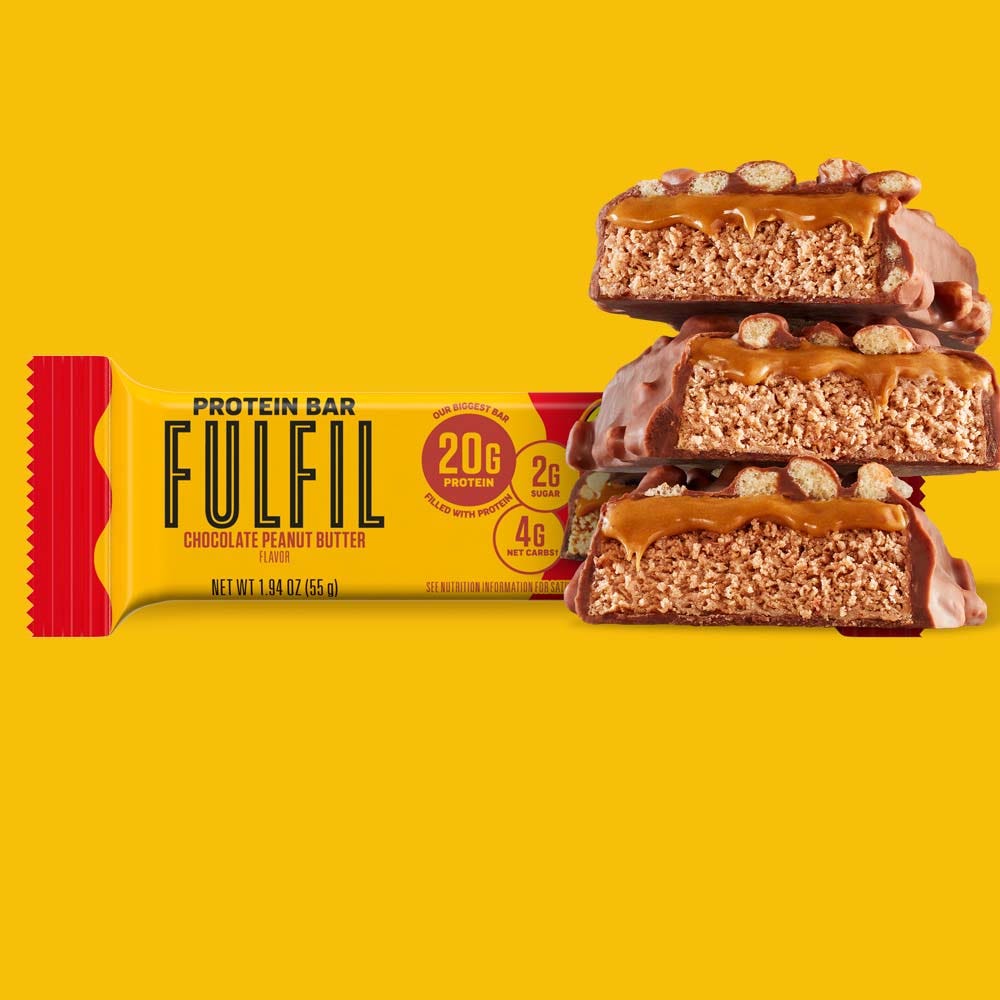stack of protein bar pieces beside fulfil chocolate peanut butter reeses flavor protein bar