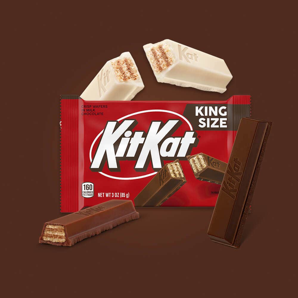 unwrapped kit kat king size bars in vanilla, milk chocolate, and dark chocolate variations